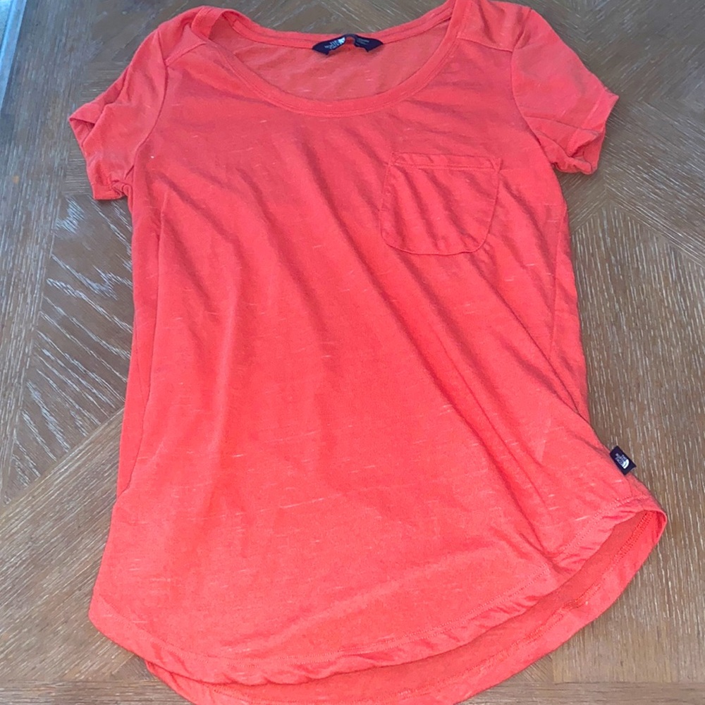 north face pink/orange color shirt with pocket (runs a little big)